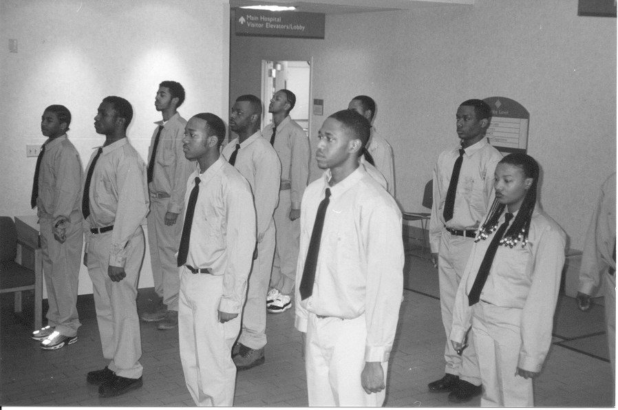The first Project 100 cohort, including Zoser Ahmad.