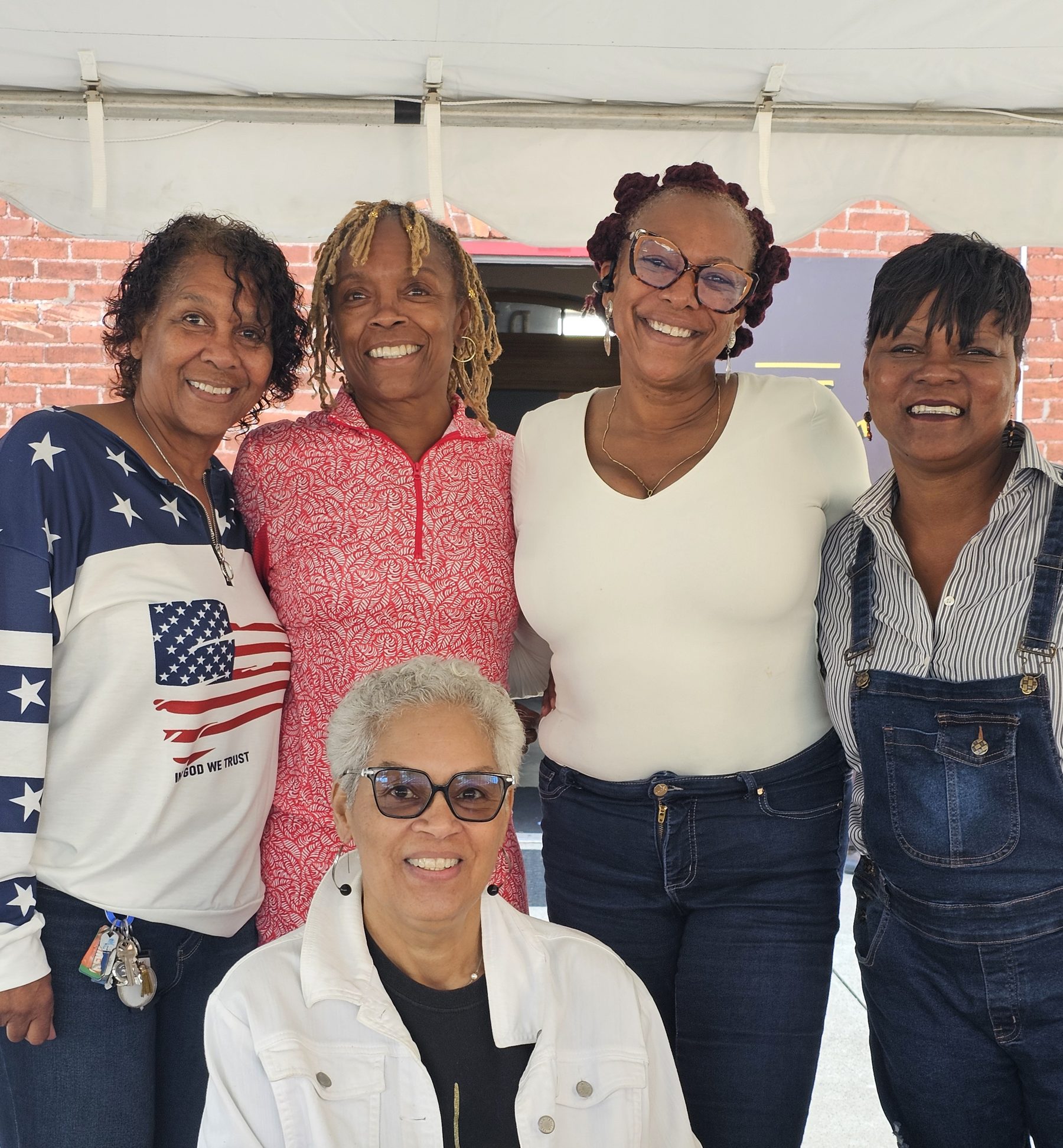 Lady Phoenix members gathered together honoring Gigi at a Phoenix event.